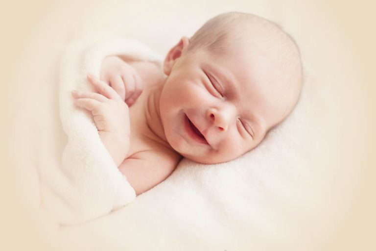 Smiling Newborn Baby